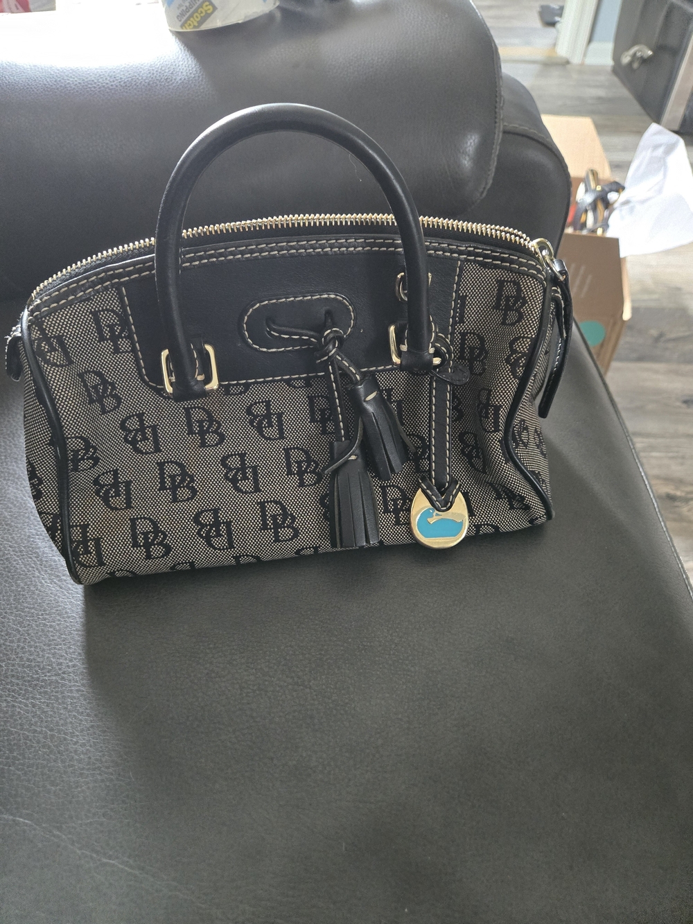 Dooney & Bourke Black Monogram Satchel with Tassel and Charm
